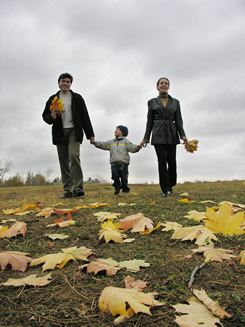 "Walking Family with Autumn Leaves" ©Paha_l|Dreamstime.com 